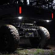 KC Cyclone Rock Lights Installed Under The Back Of The Vehicle