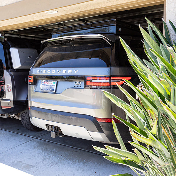 the BadAss Convoy Rooftop Tent For Land Rover Discovery 5 2017-2022 fits inside any garage