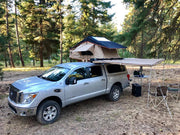 Guana Equipment Morph 270 Awning Installed On A Vehicle That Has A Roof Top Tent Installed On The Roof Rack