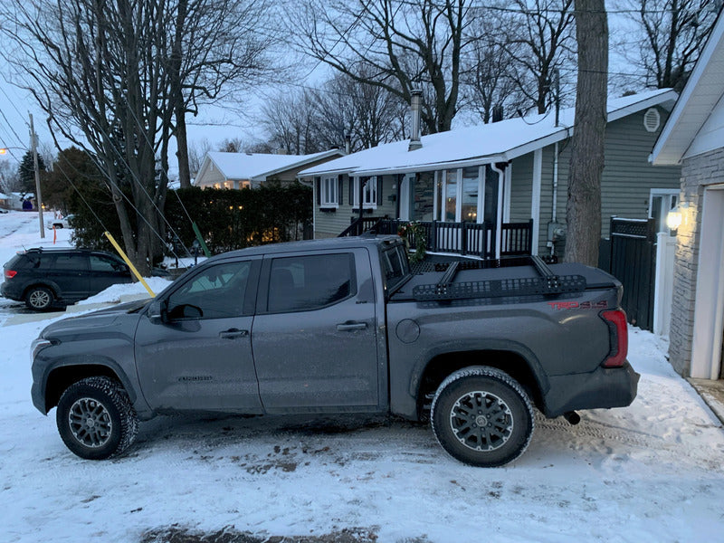 SIde View Of The Tundra With BillieBars Bed Bars With Mounted Accessory Panels