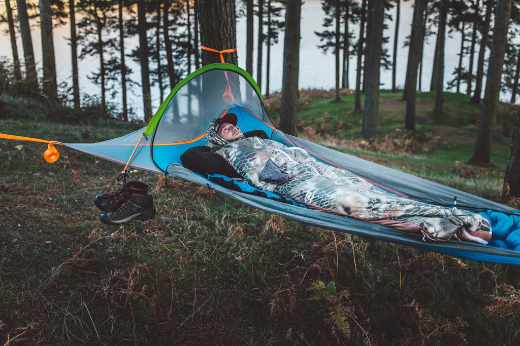 person chilling on a UNA Single Person Tree Tent - Lightest Tent Available - Ideal For Hikers - by Tentsile